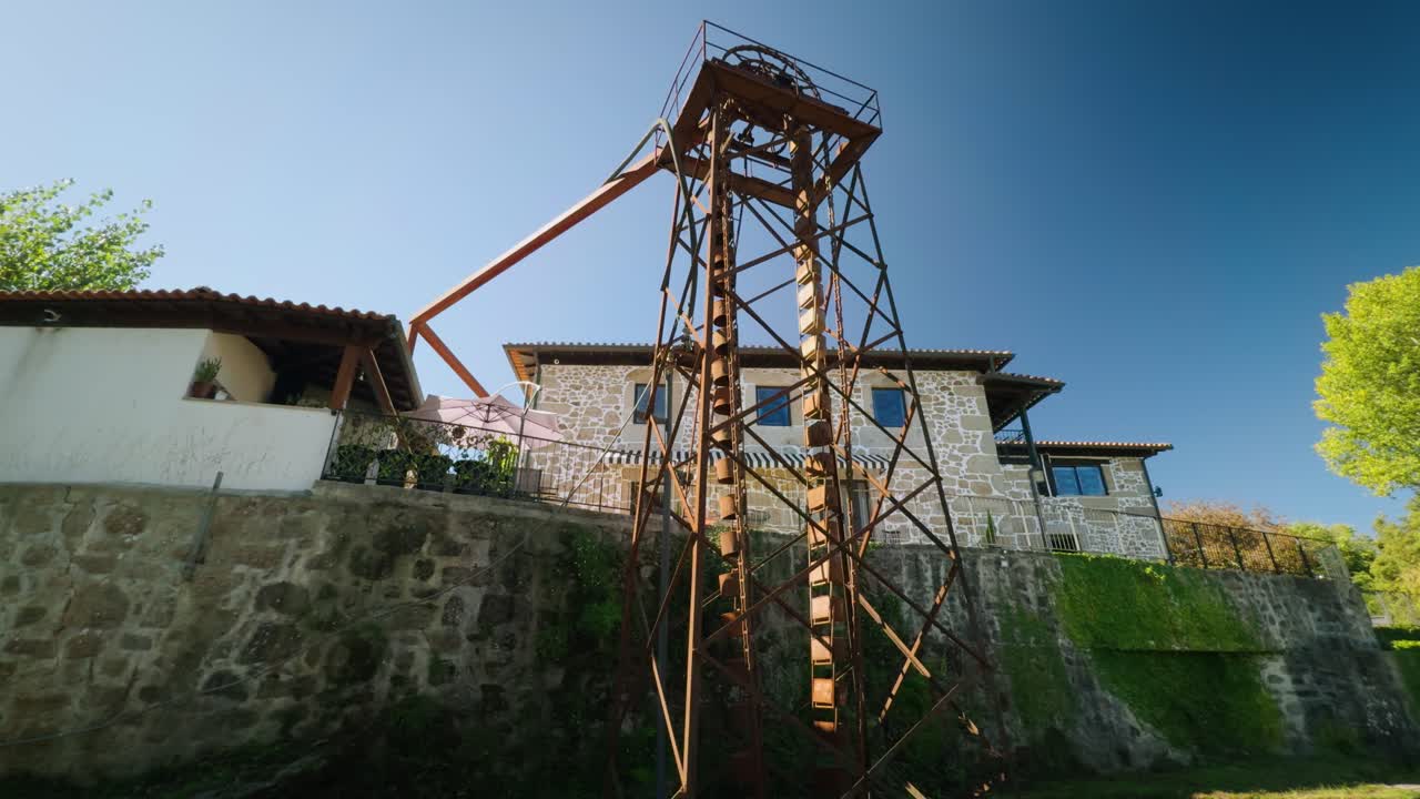 An old waterlift was powered by an axel coming from the watermill next to the tower