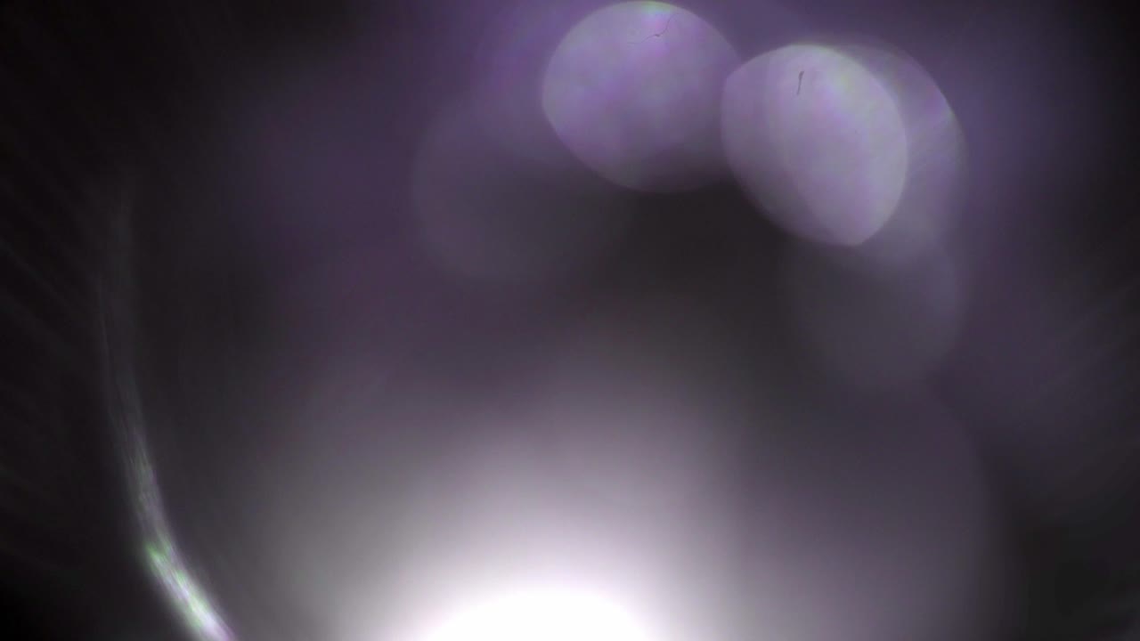 Soft Purple Lens Flares and Bokeh Light Leaks