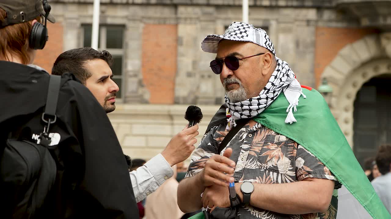 Pro Palestine protesters march against Israel’s Eurovision participation in Malmö (Sweden), calling for a ceasefire on the war in Gaza, Eurovision song contest 2024, handheld medium closeup shot