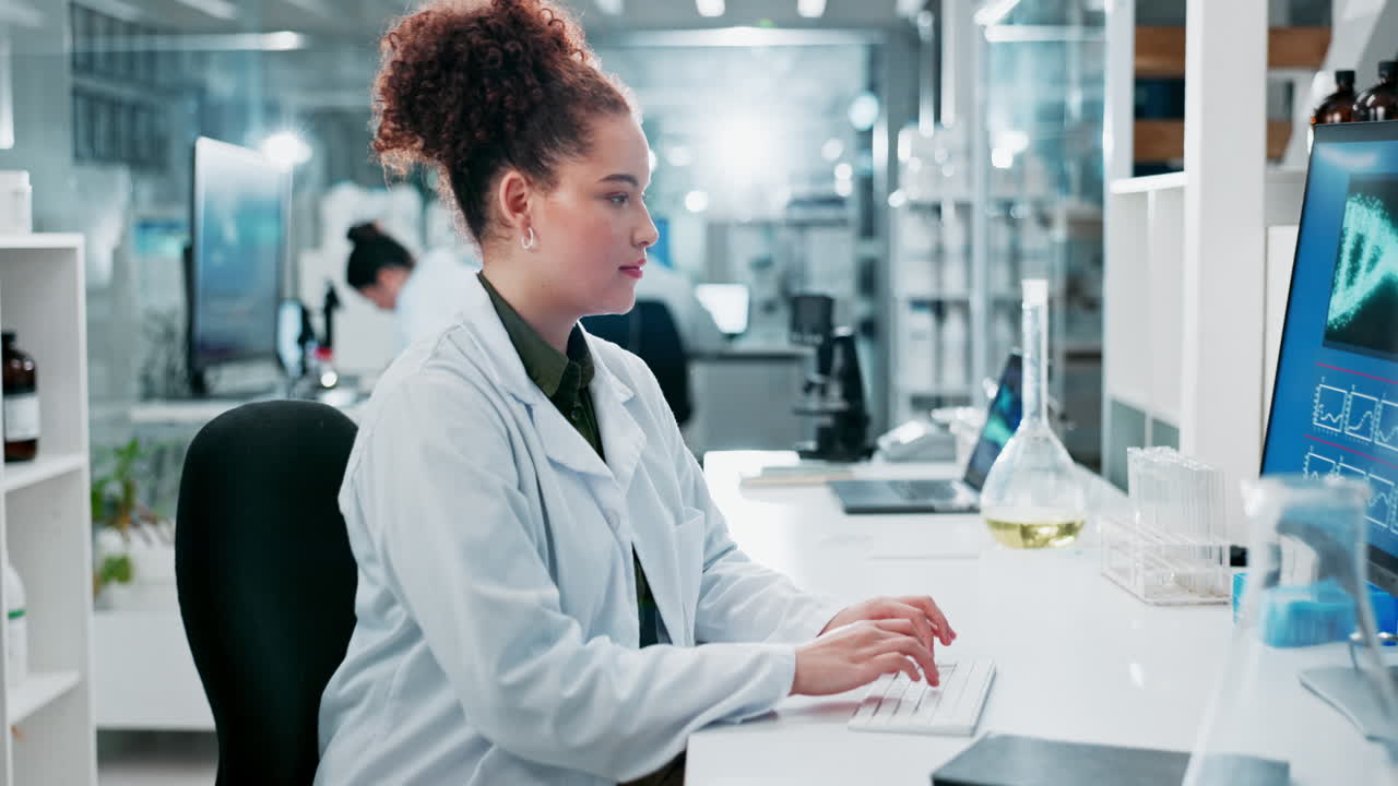 Smiling Scientist Working in a Laboratory