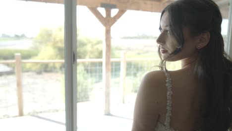 bride looking out the window