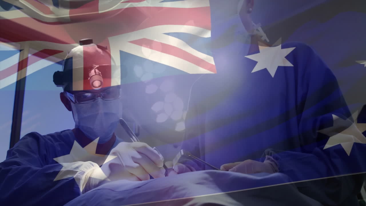 Animation of flag of australia over caucasian surgeons during surgery