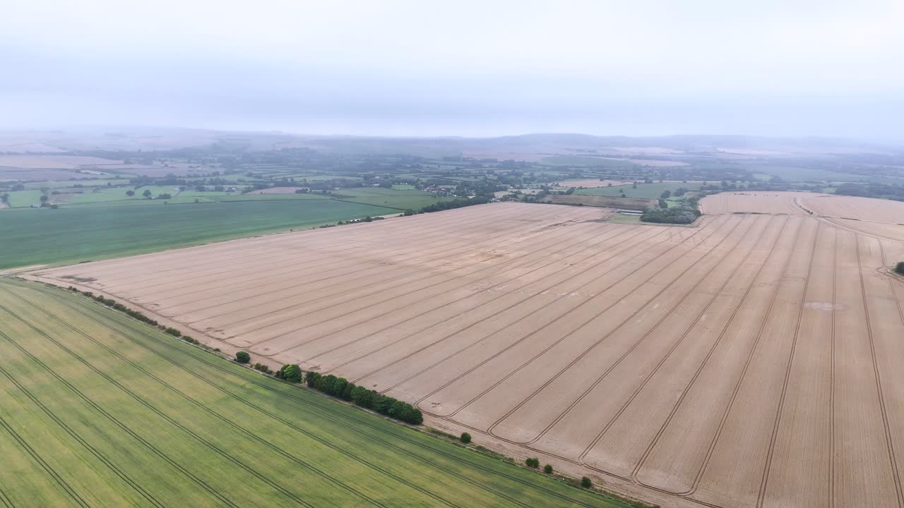 Rural Scene Of Agricultural Land With Crop Circle Near Etchilhampton Village In Wiltshire, England, United Kingdom