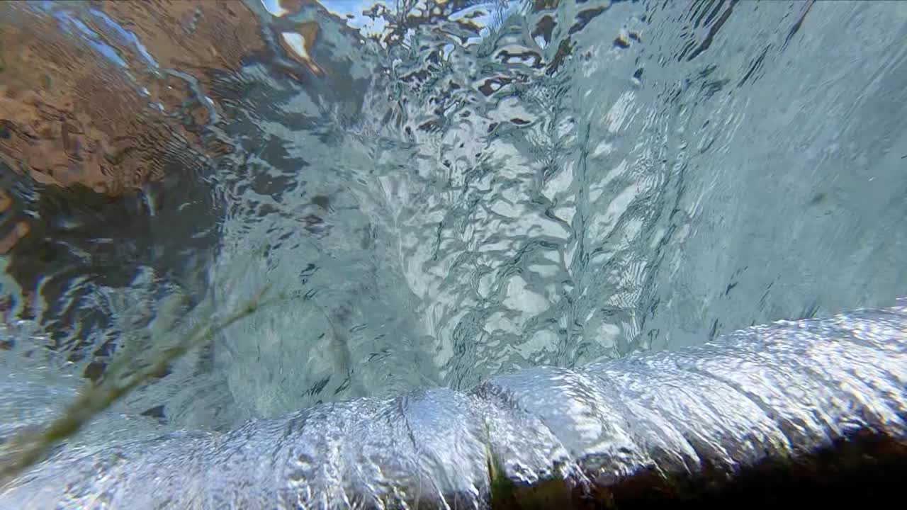 Waterfall series shot on a spring fed canal in western Texas. Series contains mostly slow motion scenes of a small waterfall including spectacular underwater footage with aquatic wildlife