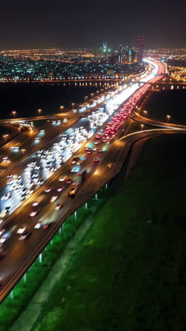 Night Highway Traffic with Light Trails in a City