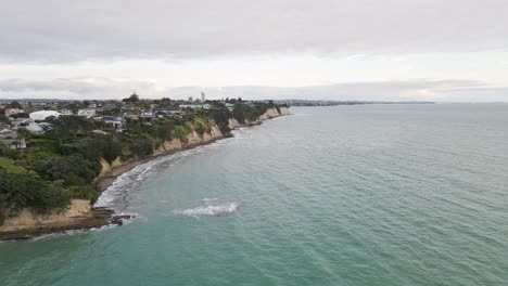 Aerial-flight-along-the-beautiful-coast-of-Narrow-Neck,-New-Zealand