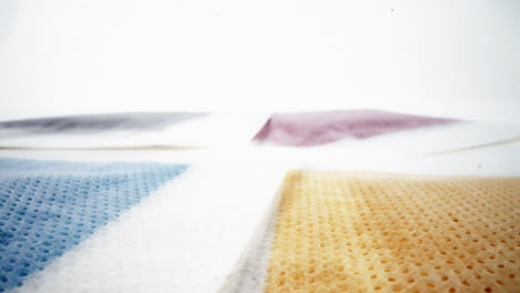 abstract soft focus of colored sponge textures in white background