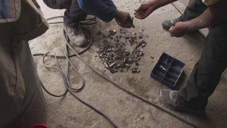 African-men-choosing-tools