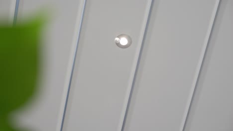 slow revealing shot of small led downlighters in a modern villa kitchen