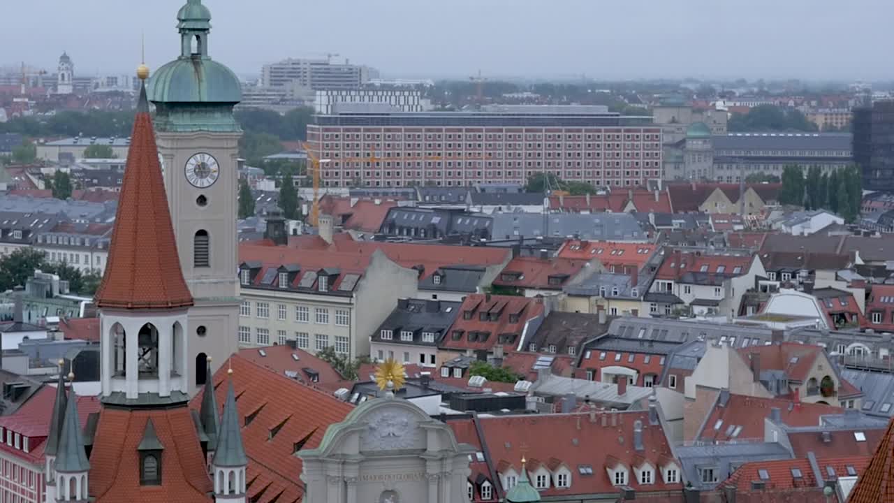 Slow-motion still landscape view of Marienplatz town square city architecture clock tower in Munich Germany Europe 1920x1080 HD