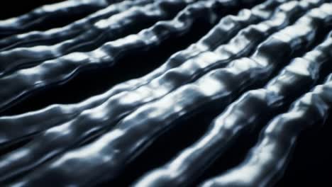 a captivating display of undulating waves reflecting light in a dark setting. the fluid movement creates an engaging atmosphere, drawing the viewer's attention.