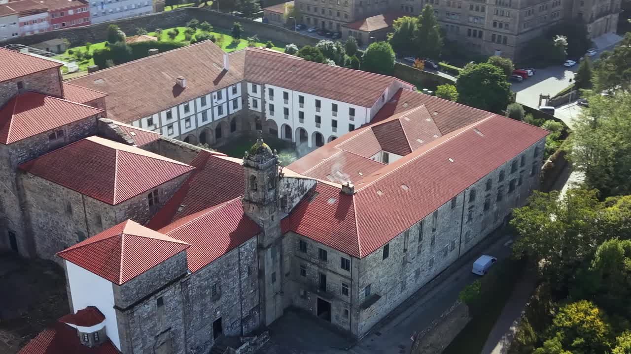 4K drone aerial view of the Belvís area in Santiago de Compostela, where you can see the church of Nuestra Señora del Portal, the convent, and the Minor Seminary