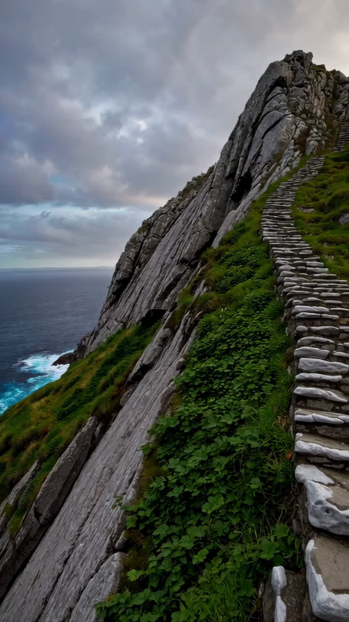 Winding Stone Staircase Up a Steep Coastal Mountain Cliff