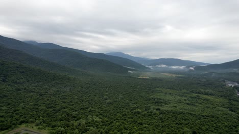 4K:-Aerial-view-of-the-verdant-mountains-in-the-eastern-region-of-Georgia-on-a-cloudy-day