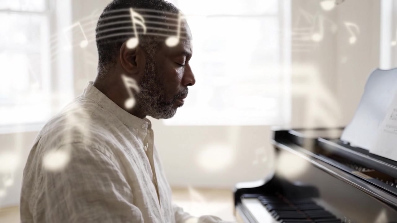 A skilled musician creates beautiful melodies at a grand piano, showcasing artistic expression and the joy of playing music in a serene environment.