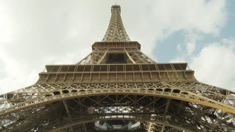 handeheld pan up of the eiffel tower tour eiffel in paris, france