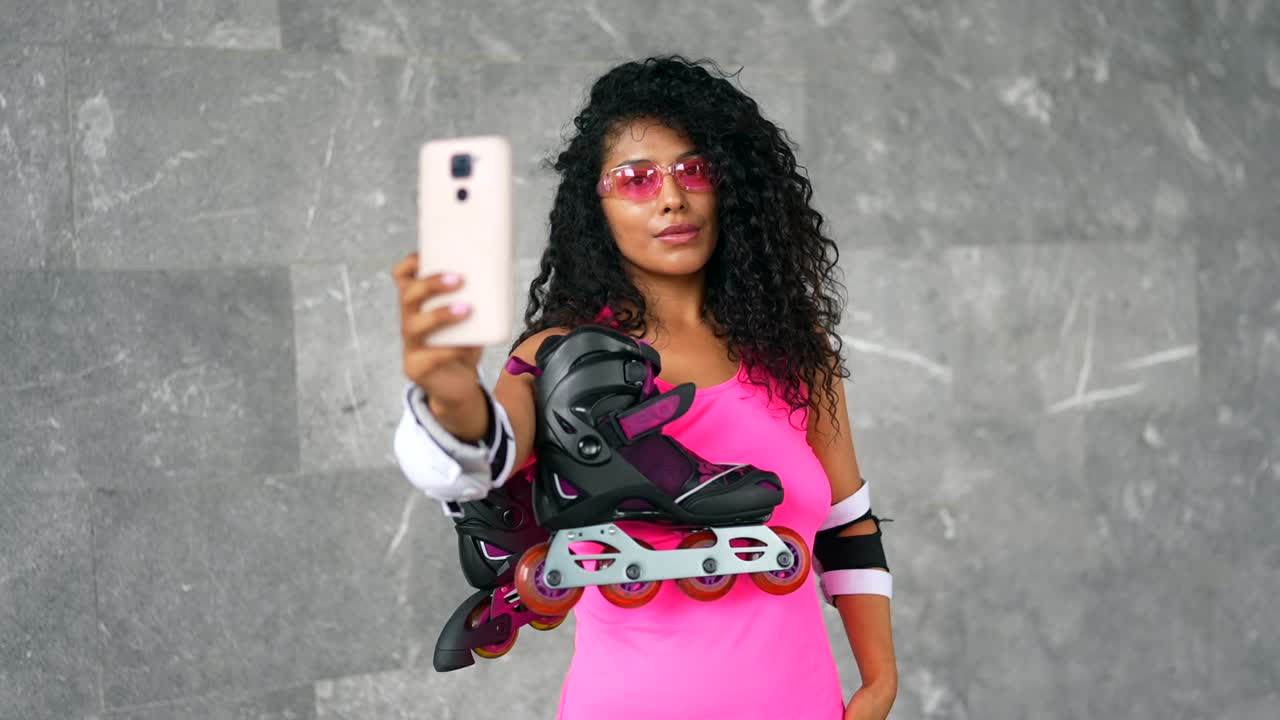 Woman taking a selfie with roller skates