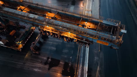 Aerial View of an Industrial Crane at Night