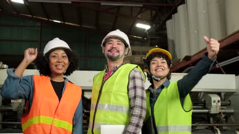 cheerful workers celebrate, hands raised together, industry jobs successful.