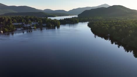 Aerial-approaching-view-of-Mirror-Lake-with-Lake-Placid-in-the-background