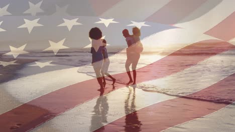 Animation-of-flag-of-united-states-of-america-over-african-american-family-on-beach