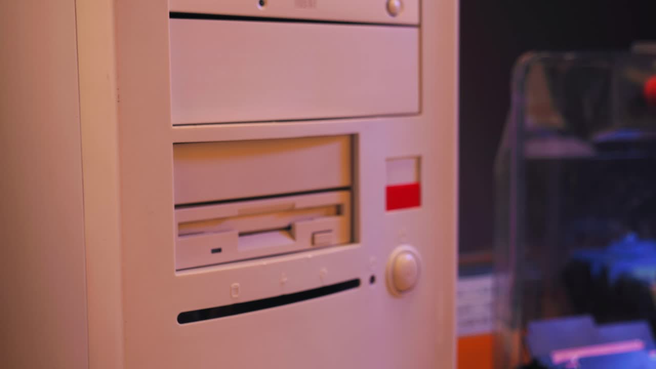 Hand loading CDs and DVDs into a computer drive