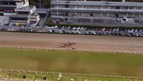 horses running in racecourse, palermo hippodrome at buenos aires city in argentina