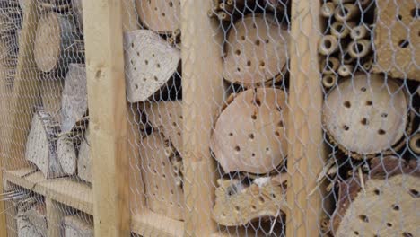 a man made insect hotel offering a house for bugs and insects in the nature