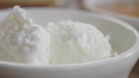 close-up of creamy white yogurt in a bowl