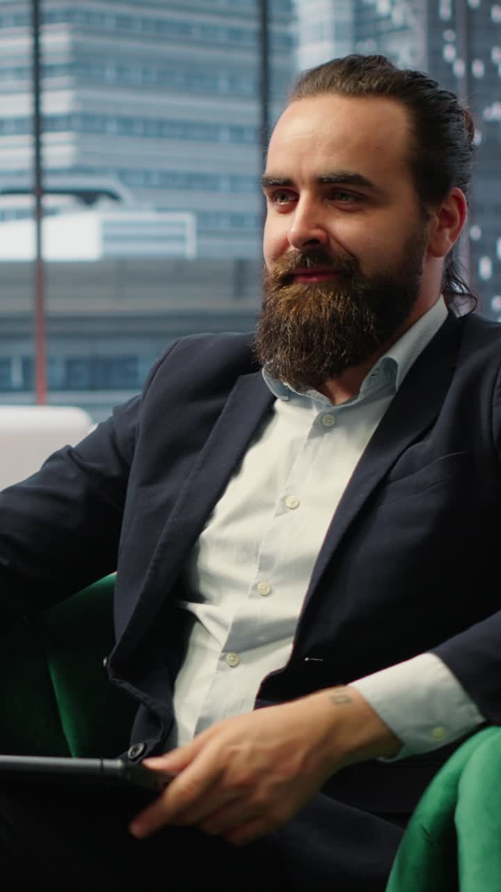 Vertical Video Successful male entrepreneur reflecting about career and achievements