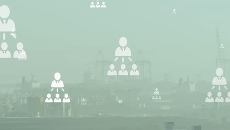 animation of network of profile icons floating against aerial view of cityscape