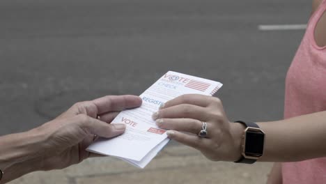 registering to vote: handing out voter registration flyers