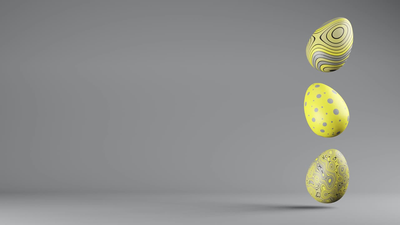 три вращающиеся пасхальные яйца в модных цветах 2021 освещающий и конечный серый, копируйте пространство.