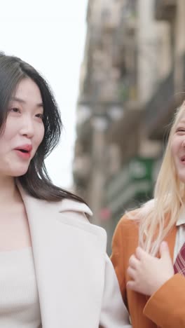 Two stylish women on a city street