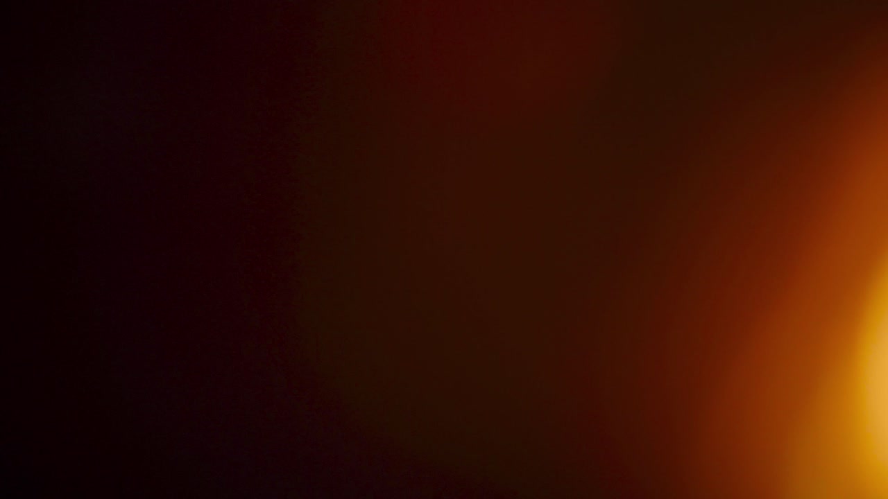 sfondo di sovrapposizione bokeh sfocato di fuoco o fiamma rossa lampeggiante nell'angolo inferiore destro