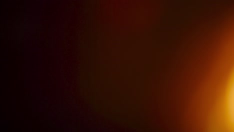 fondo de superposición de bokeh borroso de fuego o llama roja parpadeando en la esquina inferior derecha