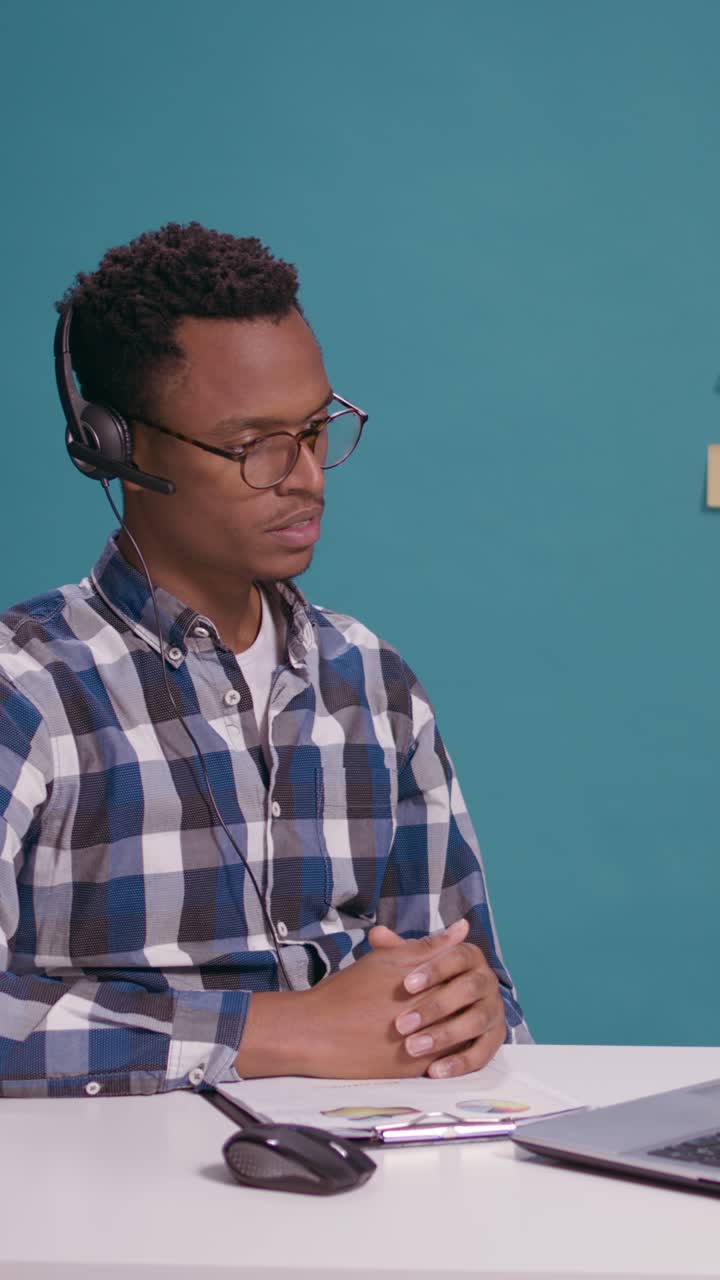 Man wearing headset during video call