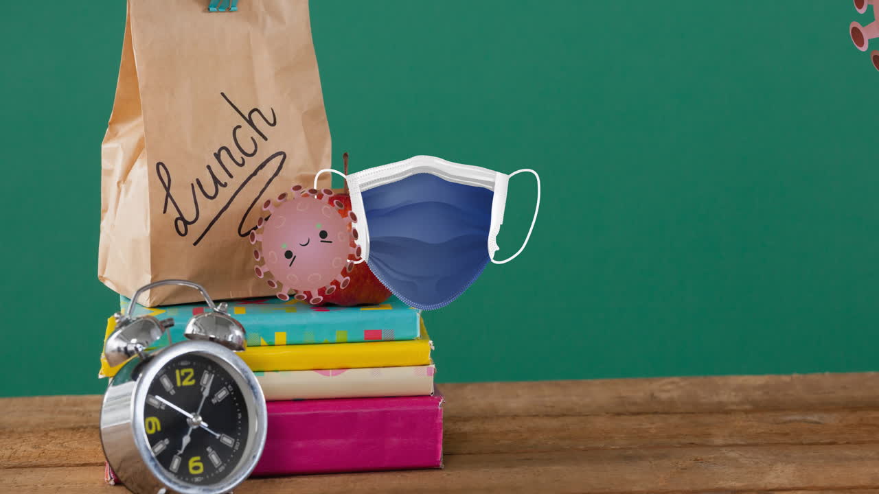Animation of angry faced covid viruses bouncing against face mask, over school books and lunch bag