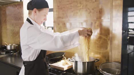 Chef-putting-the-pasta-in-boiling-water