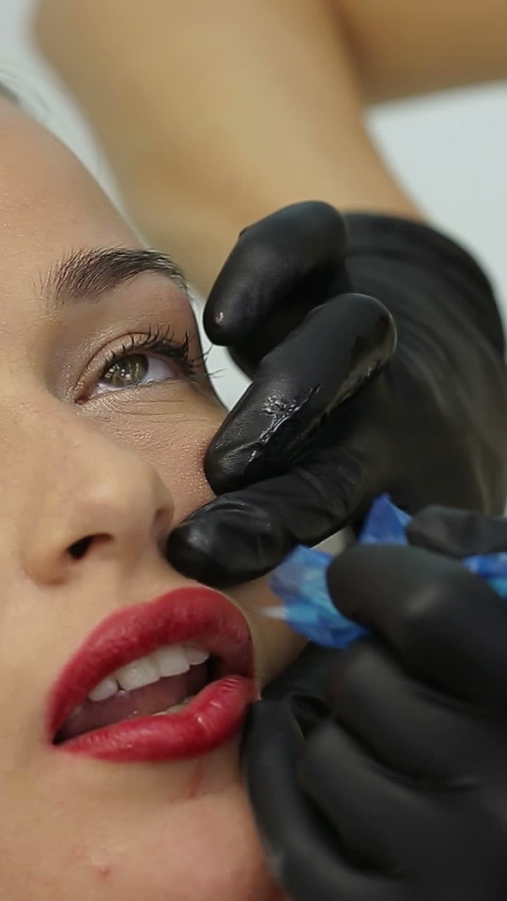 Professional Permanent Makeup. Professional cosmetologist making permanent makeup