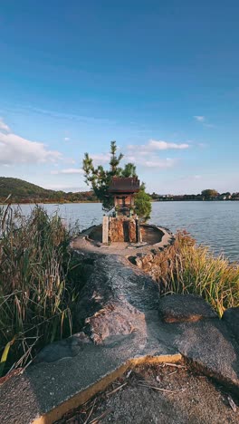 japanese shrine by a lake