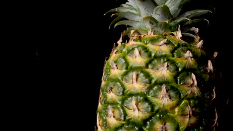 Ripe-Pineapple-Fruit---Extreme-Closeup-Panning-View-with-Black-Background