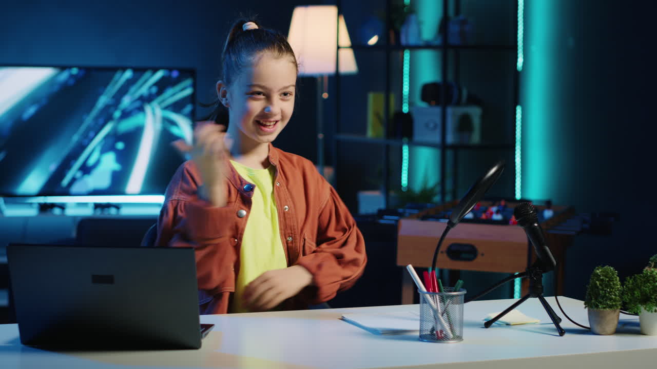 Kid content creator using recording devices to shoot intro for family vlog channel