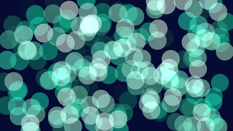 abstract design featuring a blur of green circles of varying sizes on a dark backdrop, creating an intriguing and dynamic visual pattern