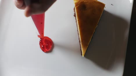 Piece-of-tasty-chocolate-cheese-cake-served-in-white-plate-on-table