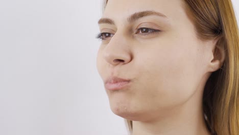 Close-up-portrait-of-woman-eating-green-apple.-Eat-fruit.