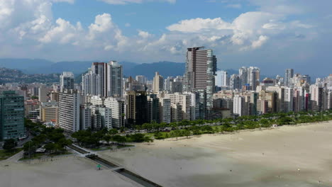 drone shot zooming in on the cityscape of santos
