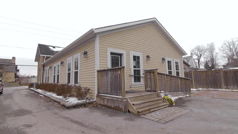 Exterior-of-a-small-yellow-office