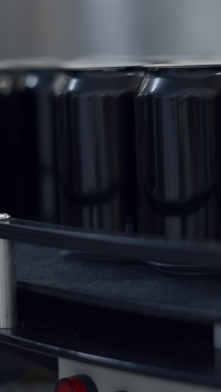 Cans Moving on a Production Line Conveyor Belt
