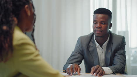 two successful businessmen black woman and black man wear suits salesman banker manager handshake happy client customer investor at business meeting make bank loan insurance investment deal agreement